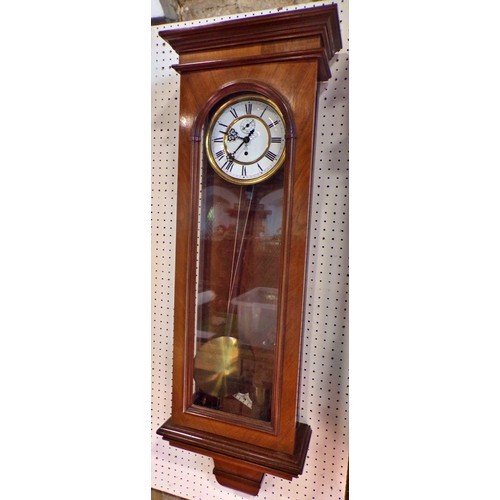 402 - A Vienna single weight wall clock, in walnut case, 88 x 33cm.