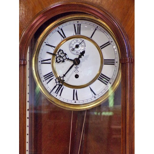 402 - A Vienna single weight wall clock, in walnut case, 88 x 33cm.