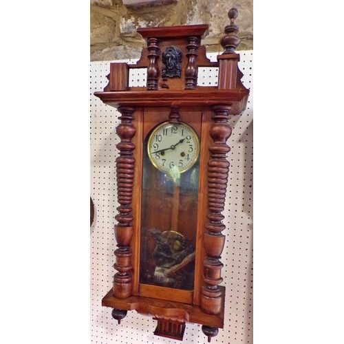 405 - A German wall clock with carved horse surmount, 91 x 34cm.