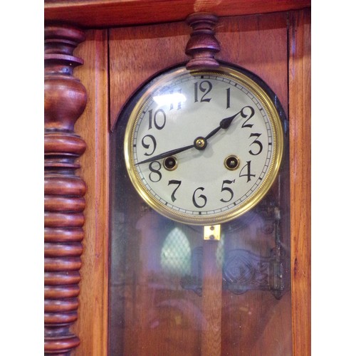 405 - A German wall clock with carved horse surmount, 91 x 34cm.