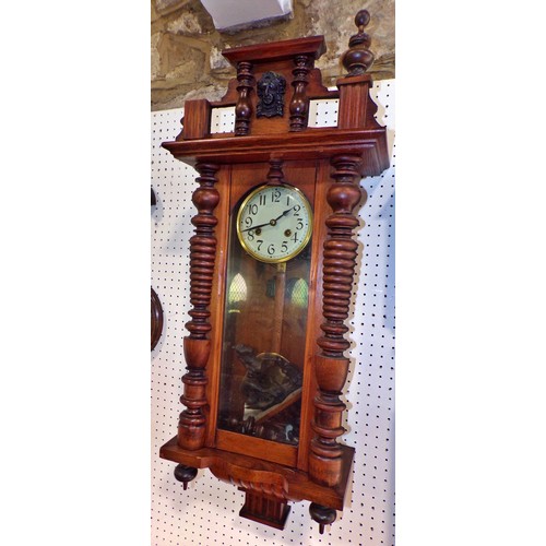 405 - A German wall clock with carved horse surmount, 91 x 34cm.