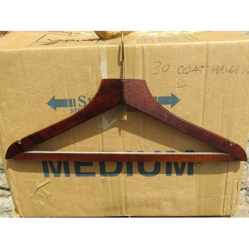 1435 - A collection of approximately 120 good quality timber clothes hangers.