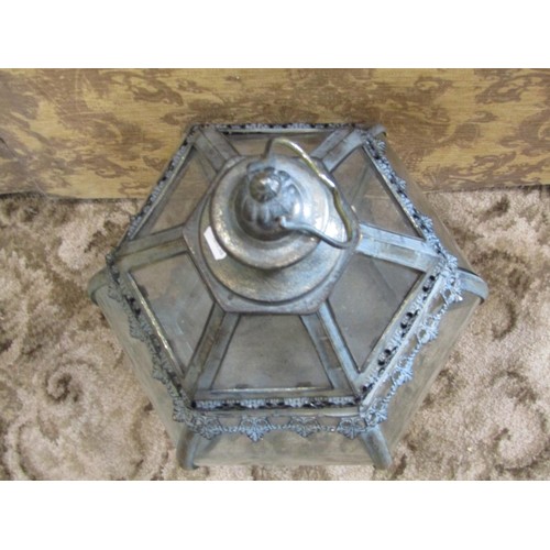 1121 - A decorative brass framed hexagonal hall lantern with verdigris effect finish, 70cm high.