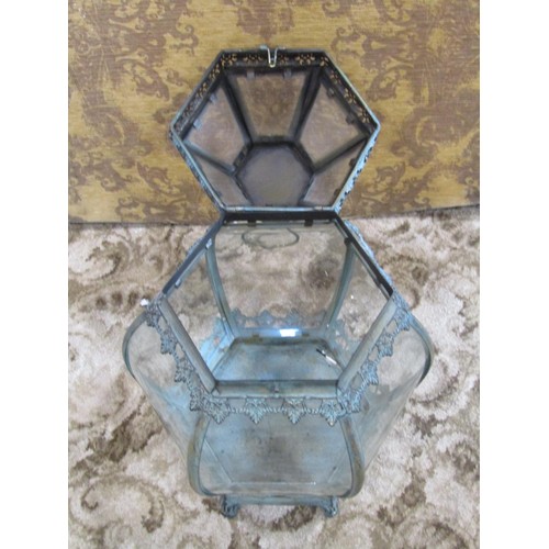 1121 - A decorative brass framed hexagonal hall lantern with verdigris effect finish, 70cm high.