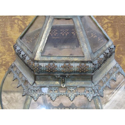 1121 - A decorative brass framed hexagonal hall lantern with verdigris effect finish, 70cm high.