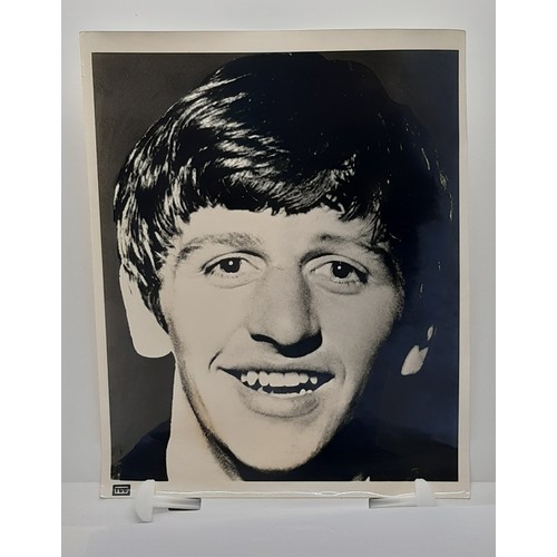 700 - Collection of four black and white photographs of The Beatles: Paul MacCartney, John Lennon, George ... 