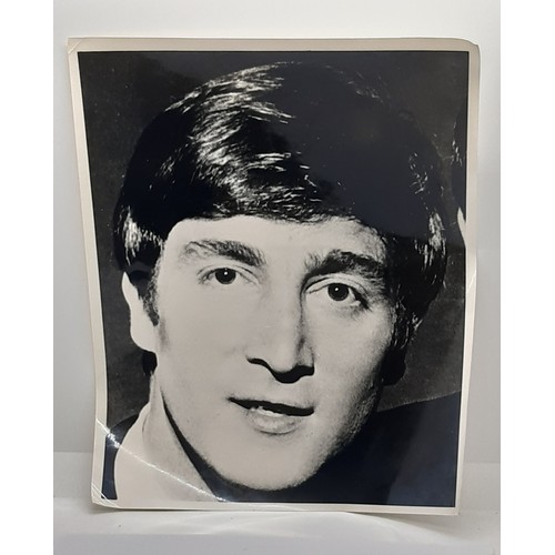 700 - Collection of four black and white photographs of The Beatles: Paul MacCartney, John Lennon, George ... 