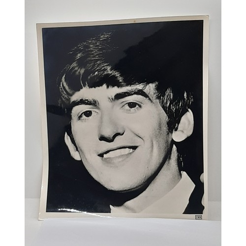 700 - Collection of four black and white photographs of The Beatles: Paul MacCartney, John Lennon, George ... 