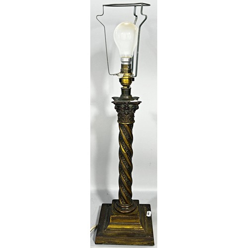 563 - A brass spiral Corinthian column table lamp on a stepped base, 37cm .