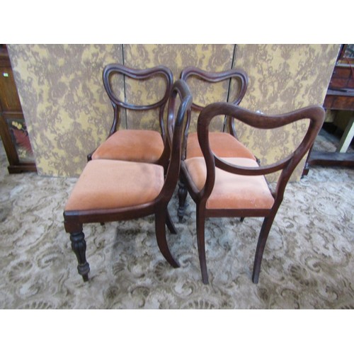 1334 - Four Victorian mahogany dining chairs with drop-in seats and turned supports.