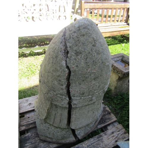 1065 - A large reconstituted stone head of a Norman soldier with helmet, 80cm high