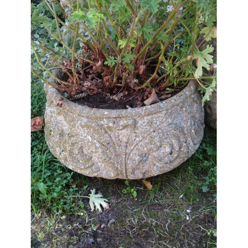 1084 - A rectangular moulded weathered composition stone garden planter, 73 x 25cm together with two circul... 