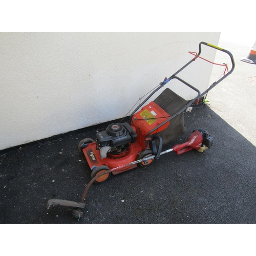 1098 - A Flymo petrol driven rotary lawn mower together with a Castor TR22CX strimmer (2)