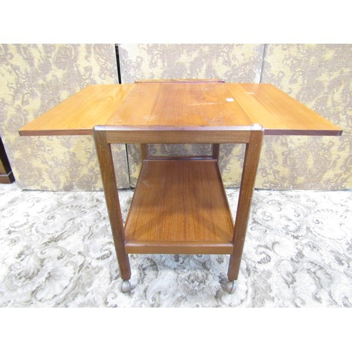 1172 - A mid 20th century teak tea trolley, a nest of occasional tables and a retro leather swivel chair (3... 