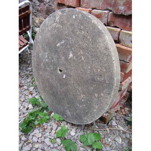 1044A - A weathered cast composition stone mill wheel, 80cm diameter