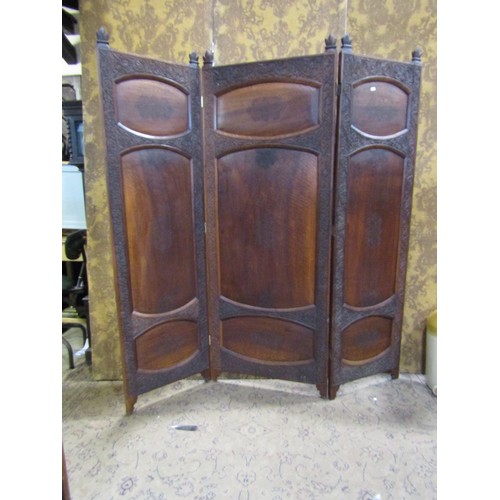 1208A - A Kashmir three fold hardwood room divider of full height with panelled frame within repeating flora... 