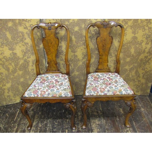 1511A - A pair of good quality walnut side chairs in the Queen Anne style, with well carved detail, with vas... 