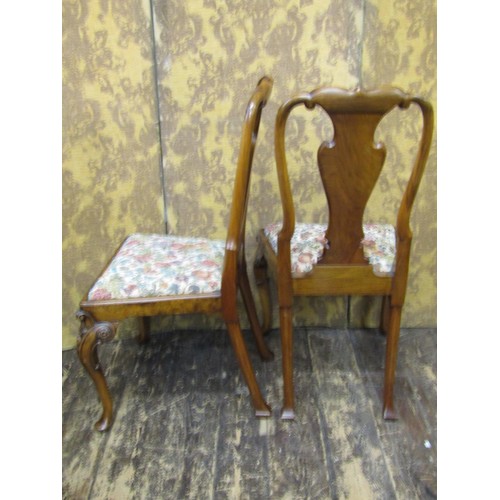 1511A - A pair of good quality walnut side chairs in the Queen Anne style, with well carved detail, with vas... 