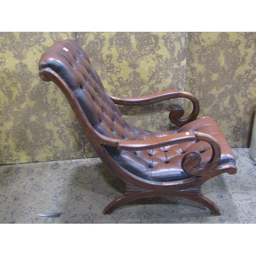 1330 - A Regency style slipper chair with button leather upholstery