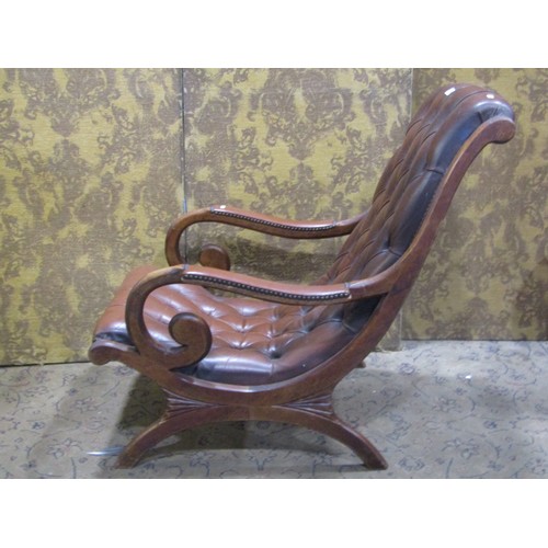 1330 - A Regency style slipper chair with button leather upholstery