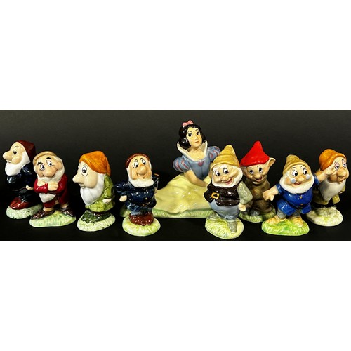 6 - A Wade group of Snow White and eight various dwarfs