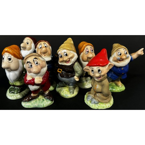 6 - A Wade group of Snow White and eight various dwarfs