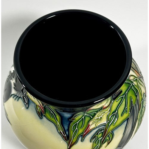 12 - A Moorcroft pottery Inglewood pattern Vase designed by Philip Gibson, decorated with birds, in origi... 