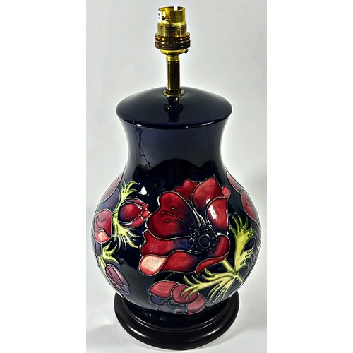 14 - A Moorcroft table lamp in the anemone pattern, 26cm high plus fittings