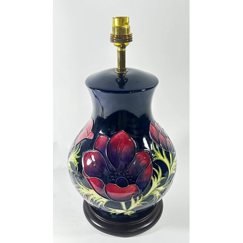 14 - A Moorcroft table lamp in the anemone pattern, 26cm high plus fittings