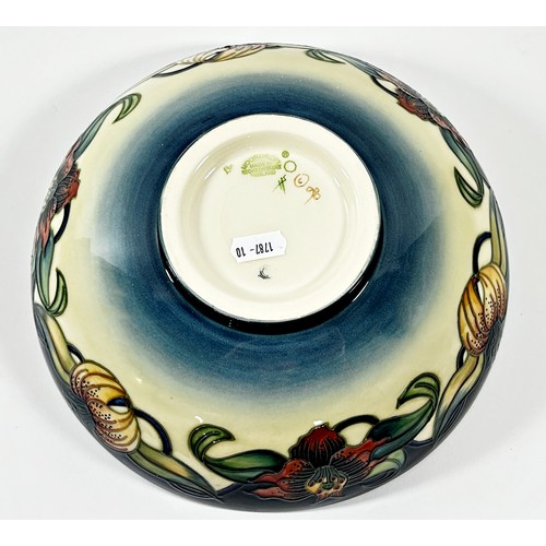 17 - A Moorcroft Anna Lily pattern bowl, in original box, 26cm diameter