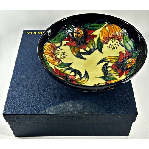 17 - A Moorcroft Anna Lily pattern bowl, in original box, 26cm diameter