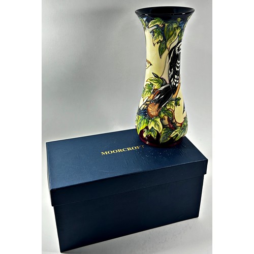 18 - A Moorcroft trumpet shaped Inglewood pattern vase showing woodpecker, tree-creeper etc, 31cm high, i... 