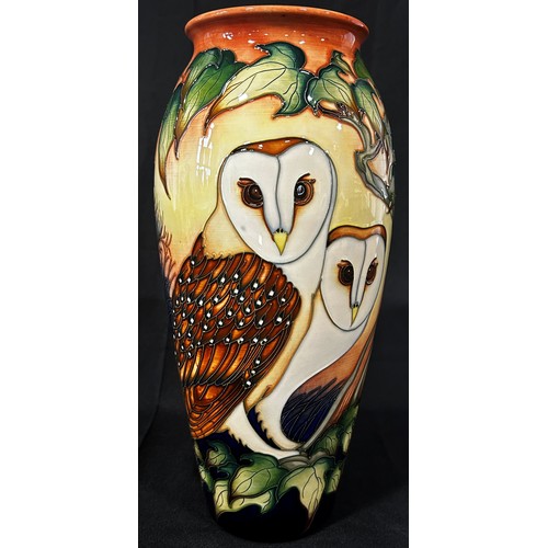 19 - A large Moorcroft owl vase by Philip Gibson, depicting barn owls amongst ivy, 36cm high