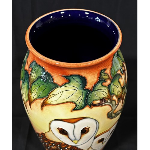 19 - A large Moorcroft owl vase by Philip Gibson, depicting barn owls amongst ivy, 36cm high