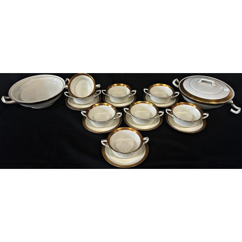 27 - A Royal Worcester Durham pattern dinner service comprising graduated plates, tureens, soup bowls, ve... 