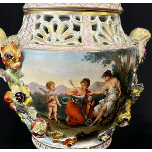 31 - A 19th century Dresden porcelain urn raised on three shaped supports with hand-painted panels showin... 