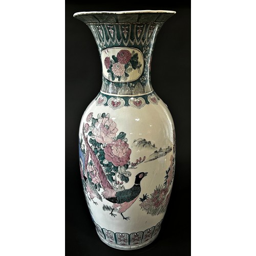 72 - A floor-standing decorative Chinese vase, 78cm high, decorated with cranes and landscape