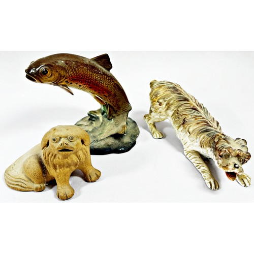 81 - Beswick figure of a leaping trout, model 1390, 19th century bisque figure of a hound and a Japanese ... 