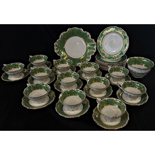 41 - George Jones green and gilt china tea ware comprising 12 cups and saucers, 10 sandwich plates, shape... 