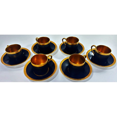 77 - A set of six Royal Worcester coffee cans and saucers in a black and gilt colourway, further Worceste... 