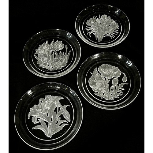 169 - Twelve Japanese Hoya Crystal Art Glass plates engraved with a flower for each month of the year, all... 