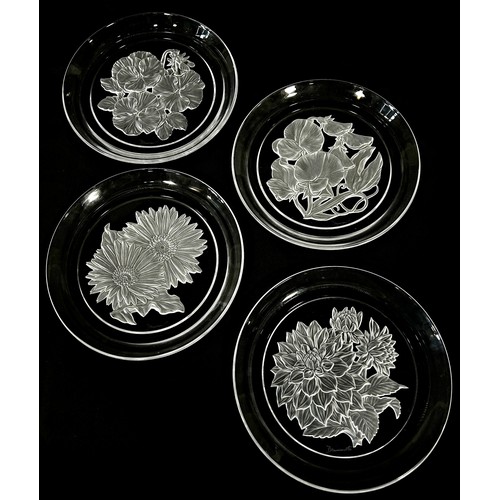 169 - Twelve Japanese Hoya Crystal Art Glass plates engraved with a flower for each month of the year, all... 