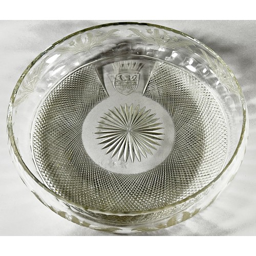 182 - A commemorative Edinburgh cut crystal glass bowl with an engraved coat of arms and a surround of Sco... 