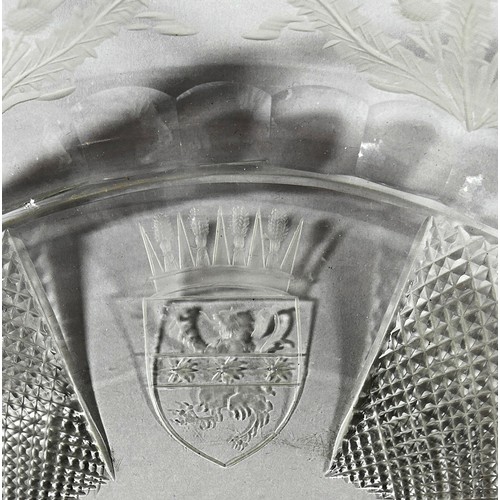 182 - A commemorative Edinburgh cut crystal glass bowl with an engraved coat of arms and a surround of Sco... 