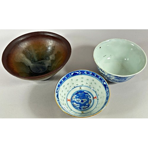 52 - A Japanese glazed terracotta bowl of flared form and two 19th century Chinese porcelain bowls with d... 