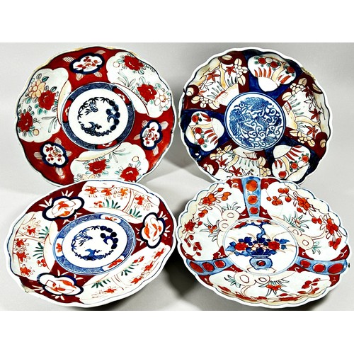 50 - Collection of Imari porcelain - four Imari dishes with fluted borders and three bowls, all with typi... 