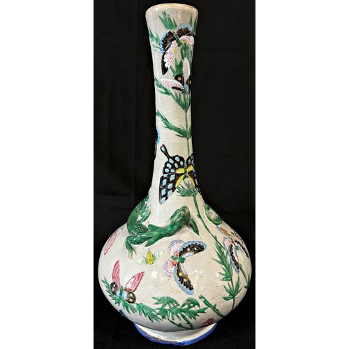 66 - A 19th century crackle glazed vase with drawn neck and moulded lizard detail with painted butterfly ... 