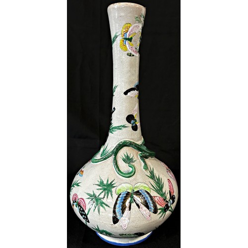 66 - A 19th century crackle glazed vase with drawn neck and moulded lizard detail with painted butterfly ... 