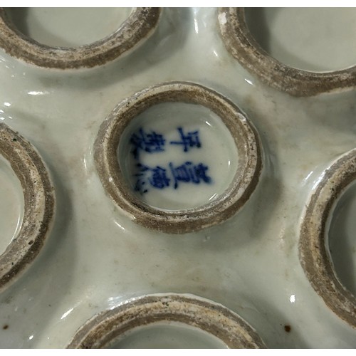 53 - A Chinese blue and white porcelain tulip case with five apertures and central stem, with floral and ... 