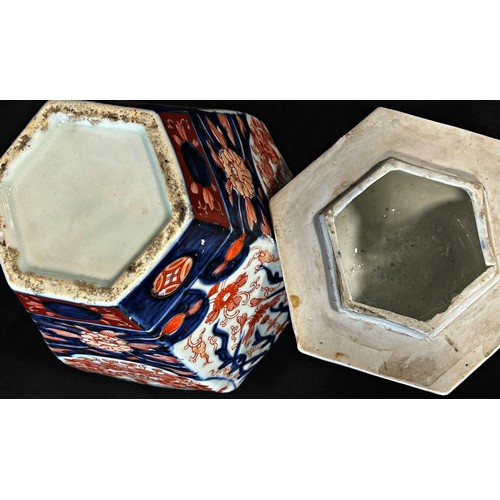 65 - 19th century Imari lidded vase of hexagonal form with typical detail